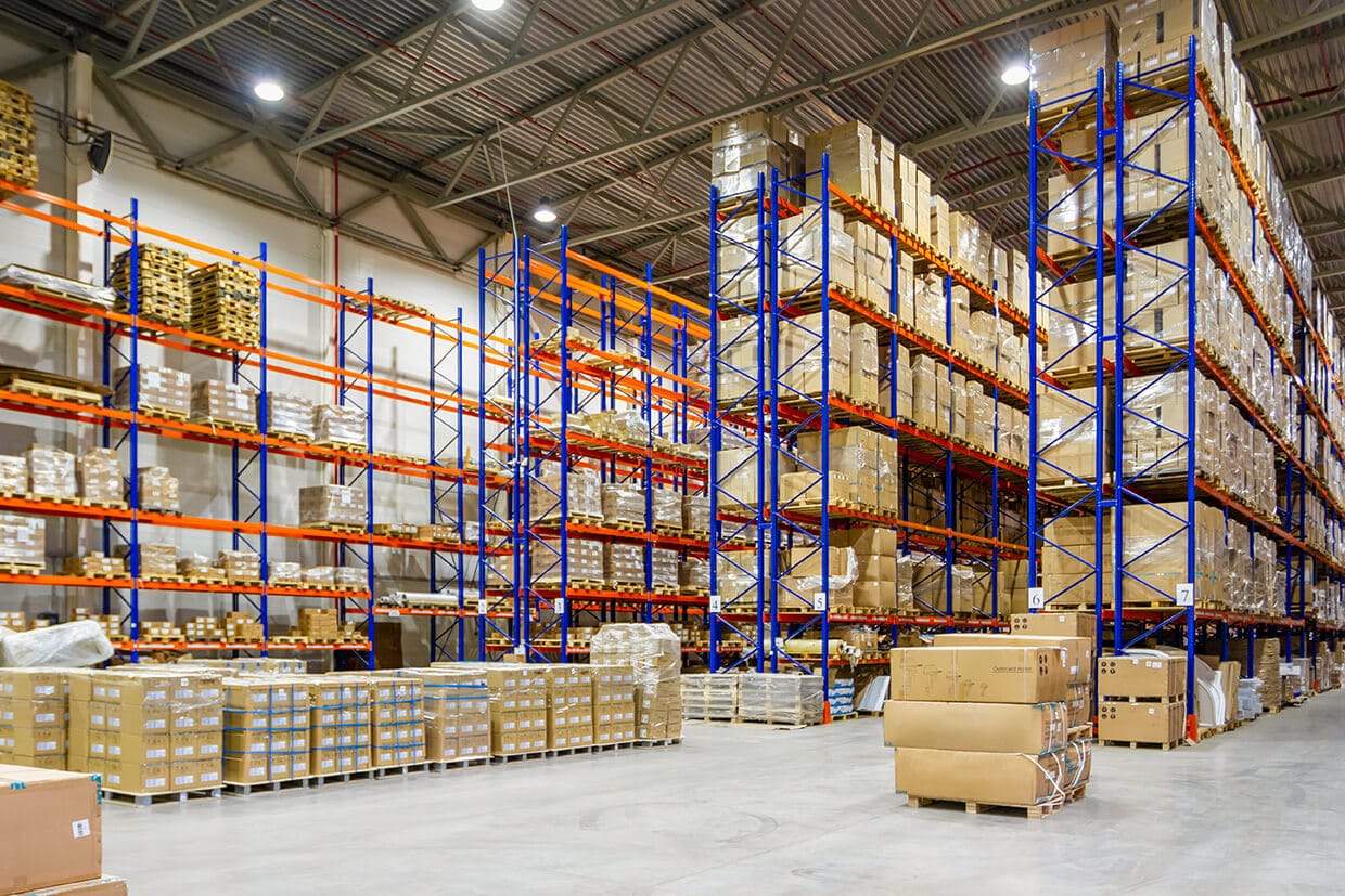 Fulfillment center with cardboard boxes stacked on shelves
